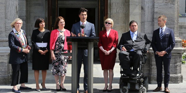 Canadian Prime Minister Justin Trudeau speaks to the press outside Rideau Hall after announcing changes to his cabinet in Ottawa on Aug. 28, 2017.