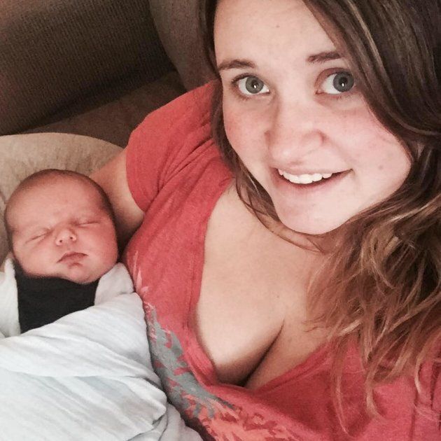 Caitlin Wilton poses with her son, Bennett, a week after he was born.