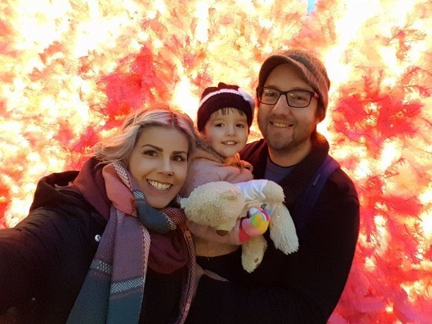 Carolyn Martin, her husband and two-year-old, Lennon, holding her teddy bear earlier this year.