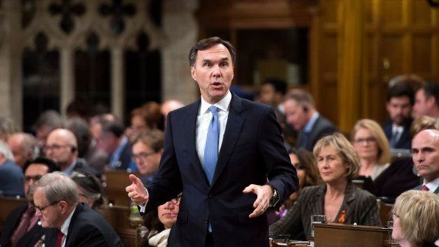 Finance Minister Bill Morneau stands during question period in the House of Commons on Parliament Hill in Ottawa on Nov. 27, 2017.