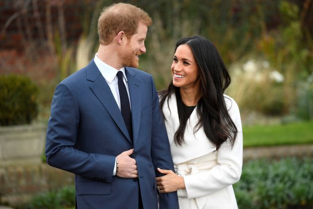 Prince Harry poses with Meghan Markle.