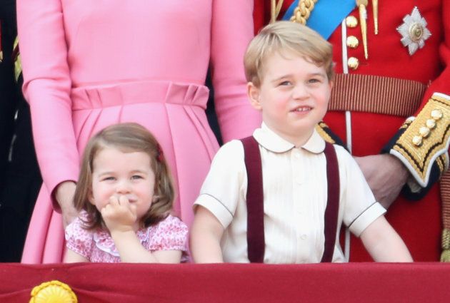 Princess Charlotte and Prince George look out from the balcony of Buckingham Palace during the Trooping the Colour parade in June 2017.