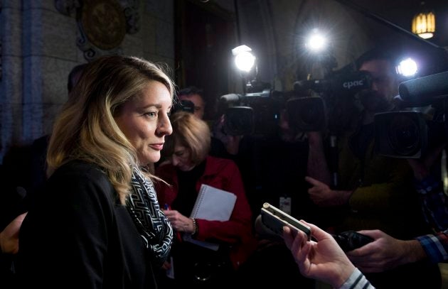 Heritage Minister Melanie Joly speaks with the media following Question Period in the House of Commons on Dec. 1, 2017 in Ottawa.