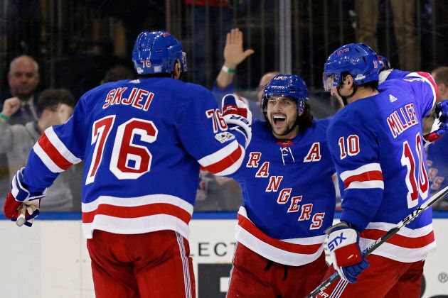 New York Rangers right wing Mats Zuccarello (36) celebrates scoring the game-winning goal against the Detroit Red Wings during overtime at Madison Square Garden, Nov 24, 2017 in New York.