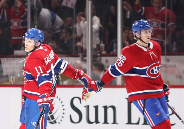 Montreal Canadiens right wing Brendan Gallagher (11) celebrates his goal against the Detroit Red Wings with teammate defenseman Jeff Petry (26) during the third period at the Bell Centre, Dec 2, 2017 in Montreal.