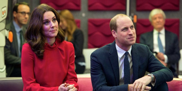 The Duke and Duchess of Cambridge listen to a presentation before speaking to school children at MediaCityUK on Dec. 6.