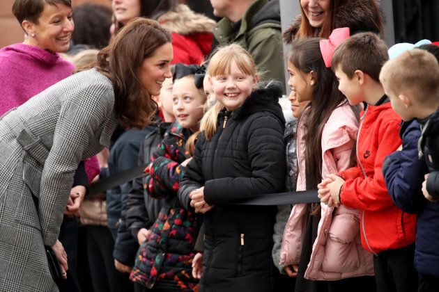 The Duchess of Cambridge talks to children as she attends a 'Stepping Out' session at Media City on Dec. 6.
