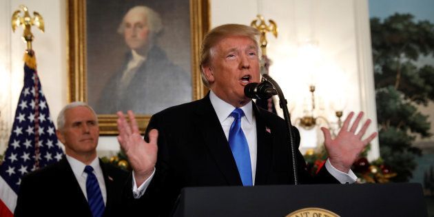 U.S. Vice-President Mike Pence listens as President Donald Trump announces that the United States recognizes Jerusalem as the capital of Israel and will move its embassy there, during an address from the White House on Dec. 6, 2017.