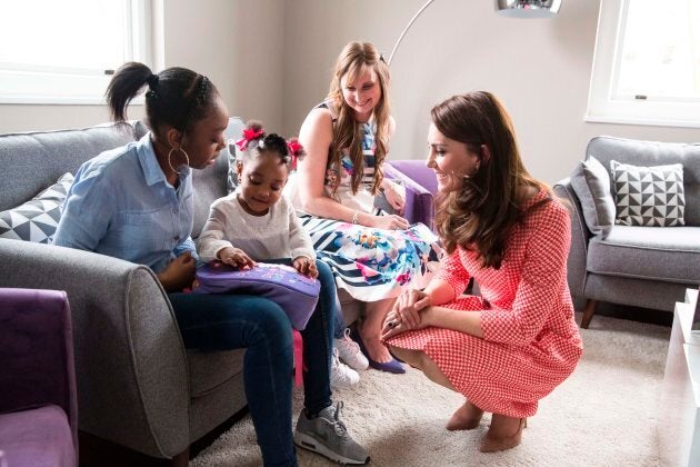 Britain's Catherine, Duchess of Cambridge, right, during a meeting with a parent support group while attending the launch of a series of films to raise awareness of maternal mental health challenges. Best Beginnings, a Charity Partner of the Heads Together campaign which is led by The Duke and Duchess of Cambridge and Prince Harry, has launched the 'Out of the Blue' film series which explores a range of mental health conditions from low mood and anxiety to more severe forms of depression. / AFP PHOTO / POOL / Heathcliff O'Malley (Photo credit should read HEATHCLIFF O'MALLEY/AFP/Getty Images)