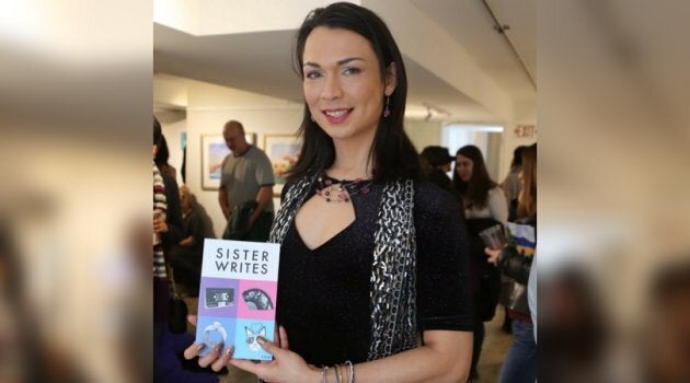 Xica DaDiva poses with a copy of Sister Writes magazine. Her story, 'My Mom's Bosom,' was published in the magazine in January 2017.