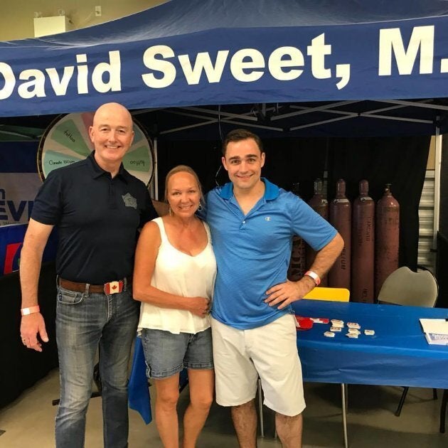 Chris Sweet is shown with his parents.