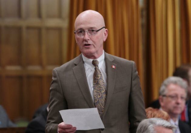 David Sweet is shown speaking in the House of Commons.
