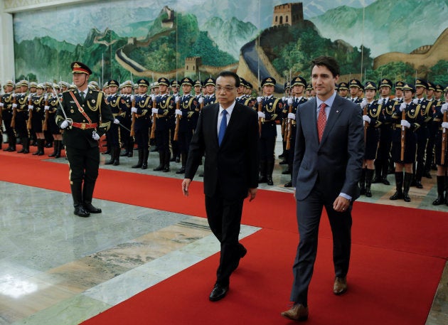 Prime Minister Justin Trudeau and Chinese Premier Li Keqiang attend a welcoming ceremony at the Great Hall of the People in Beijing, on Dec, 4, 2017.