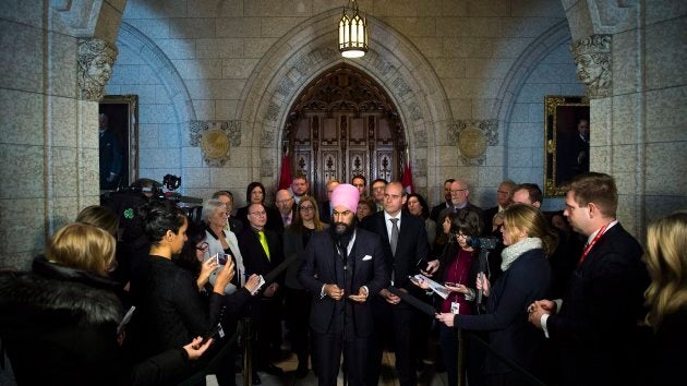 NDP Leader Jagmeet Singh is joined by members of his party as they hold press conference on Parliament Hill in Ottawa on Dec. 13, 2017.