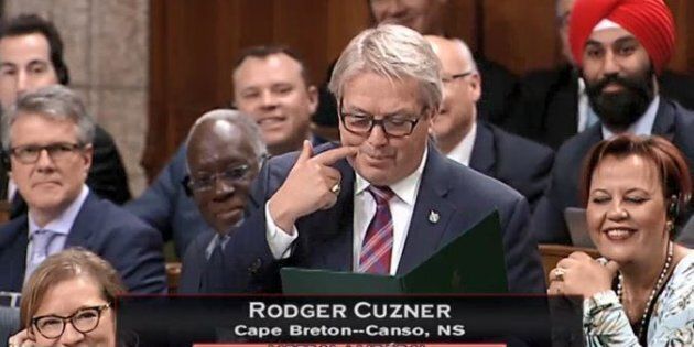 Rodger Cuzner gestures in the House of Commons while making fun of Tory Leader Andrew Scheer's dimples on Dec. 13, 2017.