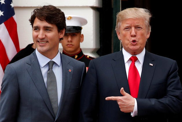 U.S. President Donald Trump welcomes Canada's Prime Minister Justin Trudeau on the South Lawn before their meeting about the NAFTA trade agreement at the White House in Washington on Oct. 11, 2017.
