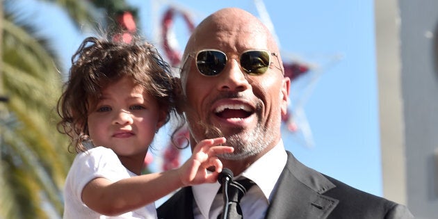 Dwayne Johnson and his daughter Jasmine at the Hollywood Walk of Fame on Dec. 13, 2017.