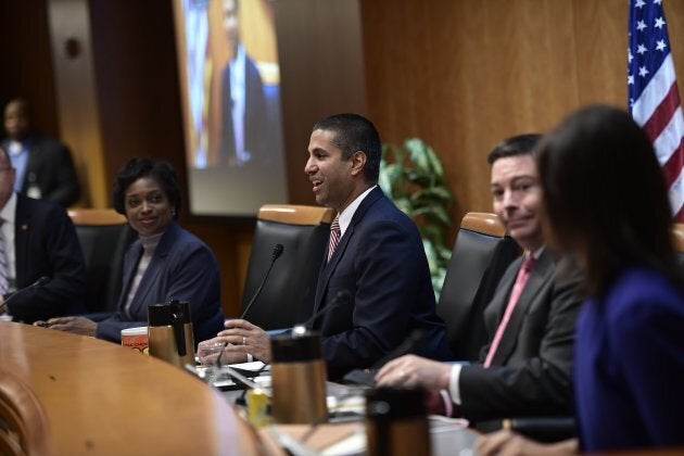 FCC Chairman Ajit Pai speaks during a hearing at the Federal Communications Commission, after it was briefly interrupted and evacuated by police due to security reasons on Thursday.