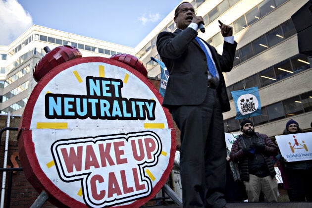 Representative Keith Ellison, a Democrat from Minnesota, speaks during a rally opposing the roll back of net neutrality rules outside the Federal Communications Commission (FCC) headquarters ahead of a open commission meeting on Thursday.