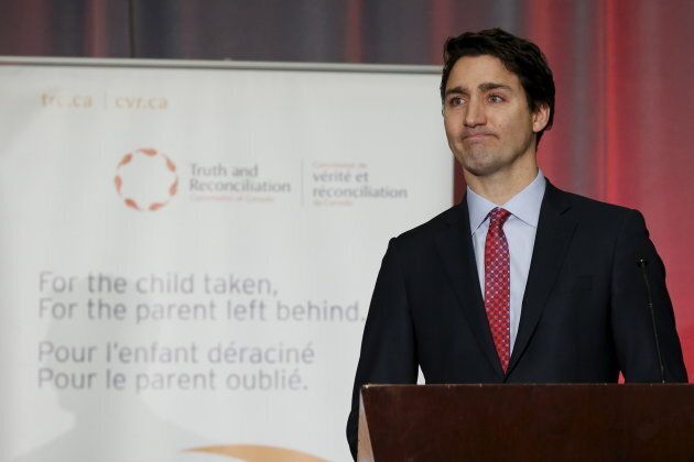 Prime Minister Justin Trudeau pauses while speaking during the release of the Truth and Reconciliation Commission's final report in Ottawa on Dec. 15, 2015.