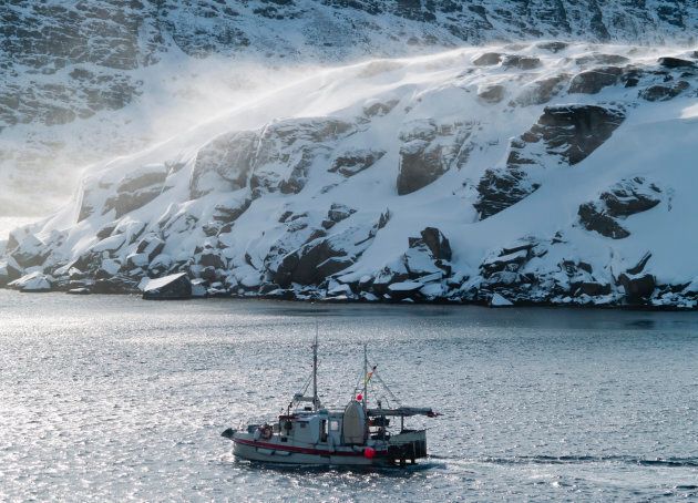 Fishing boat on the Barents Sea in Norway's arctic region in winter.
