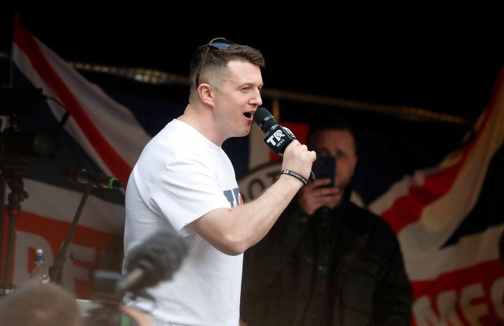 Tommy Robinson speaks during a rally in Parliament Square after the final leg of the "March to Leave" in London, Friday, March 29.
