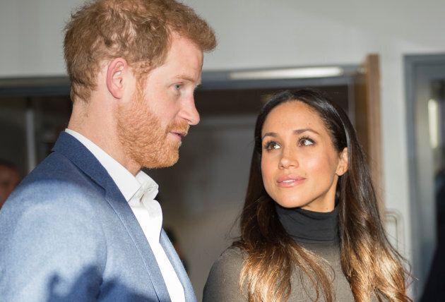 Prince Harry and his fiancee Meghan Markle visit the Nottingham Academy school in Nottingham, Britain, Dec. 1, 2017.