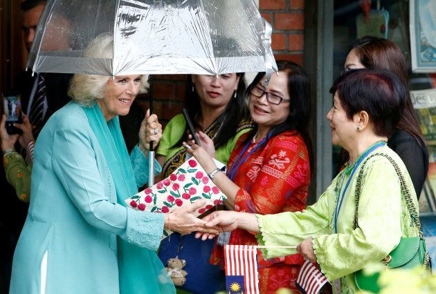 Camilla, Duchess of Cornwall greets worshippers as she leaves St. Mary's Cathedral after a church service in Kuala Lumpur, Malaysia.