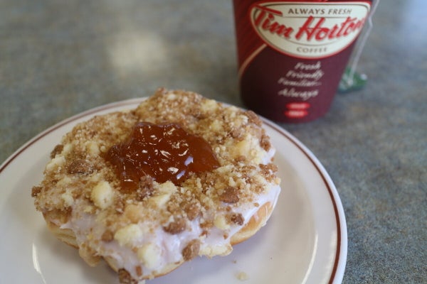 Tim Hortons Has a New Oreo Dream Donut That's Topped With Vanilla Icing and  Cookie Pieces