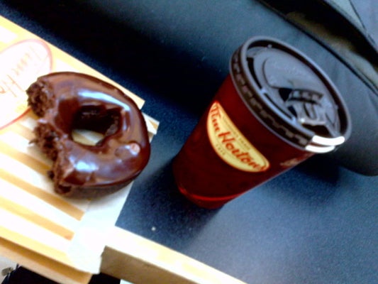 Tim Hortons Has a New Oreo Dream Donut That's Topped With Vanilla Icing and  Cookie Pieces