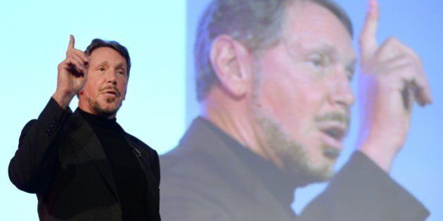 Larry Ellison, CEO of Oracle Corporation, gestures as he makes a speech during the New Economy Summit 2014 in Tokyo on April 9, 2014. More than 1,000 business leaders, entrepreneurs, businessmen and students took part in the two-day forum. AFP PHOTO/Toru YAMANAKA (Photo credit should read TORU YAMANAKA/AFP/Getty Images)