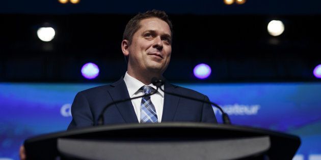 Andrew Scheer smiles after being named the Conservative Party's leader in Toronto on May 27, 2017.