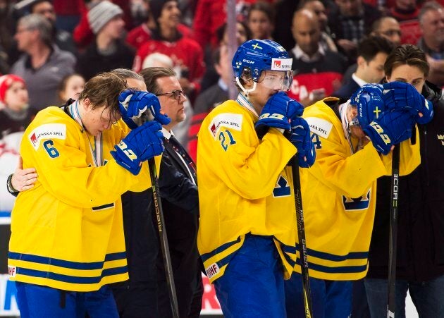 Sweden defenceman Linus Högberg (6) and Jesper Boqvist (21) look on after being defeated by Canada during the gold medal final of the IIHF World Junior Championships on Friday.
