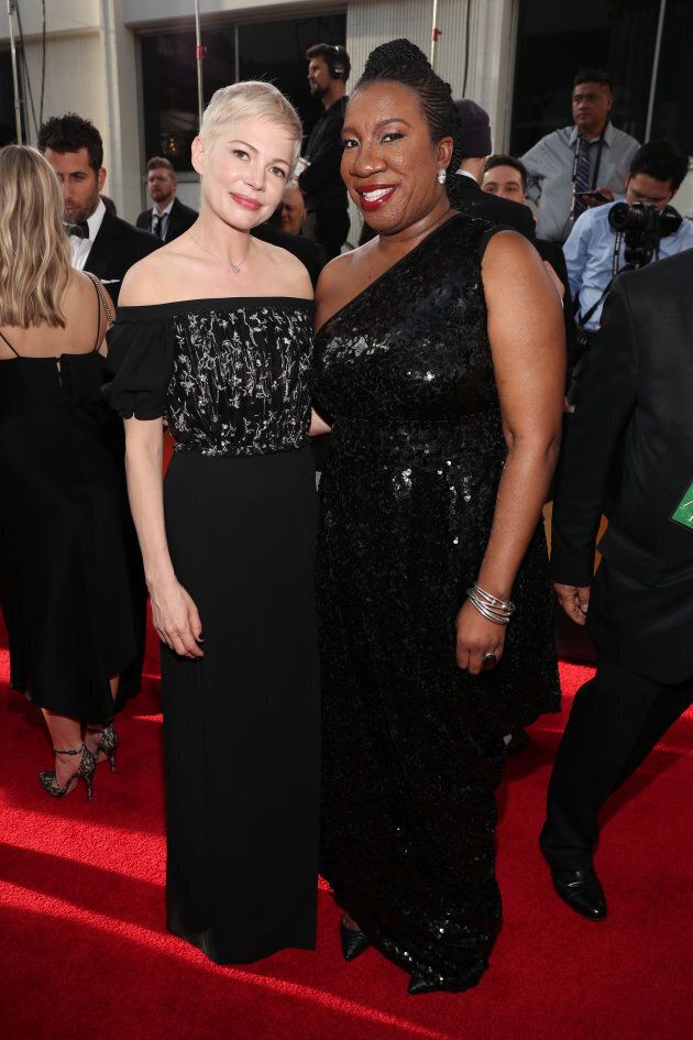Michelle Williams and activist Tarana Burke at the 75th Annual Golden Globe Awards on Jan. 7.