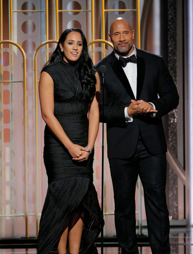 Golden Globe Ambassador Simone Garcia Johnson and her dad, Dwayne Johnson, speak onstage during the 75th annual Golden Globe Awards.
