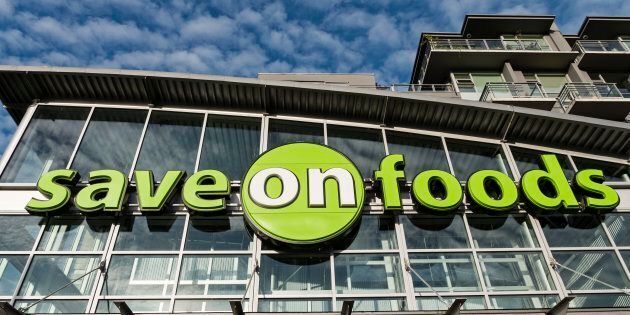 A Save-On-Foods sign on Cambie Street in Vancouver, June 17, 2015. The grocery chain is offering a $25 rebate to some of its customers in the wake of allegations of bread price-fixing.
