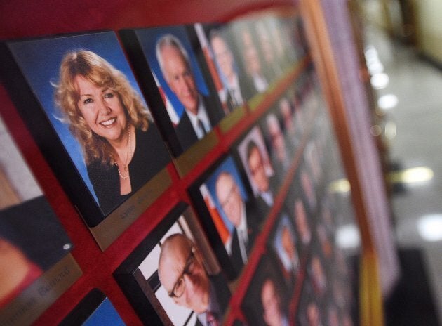 A picture of Sen. Lynn Beyak accompanies other senators official portraits on a display outside the Senate on Parliament Hill in Ottawa on Sept. 21, 2017.