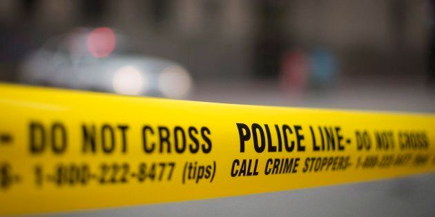 Police tape is shown in Toronto.