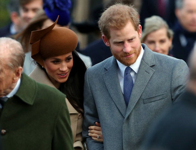 Prince Harry and his fiancee, Meghan Markle, arrive at St. Mary Magdalene's church for the Royal Family's Christmas Day service on the Sandringham estate in eastern England, Dec. 25, 2017.