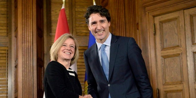 Prime Minister Justin Trudeau and Alberta Premier Rachel Notley (left) shake hands during a meeting on Parliament Hill, Tuesday, Nov. 29, 2016 in Ottawa. THE CANADIAN PRESS/Justin Tang