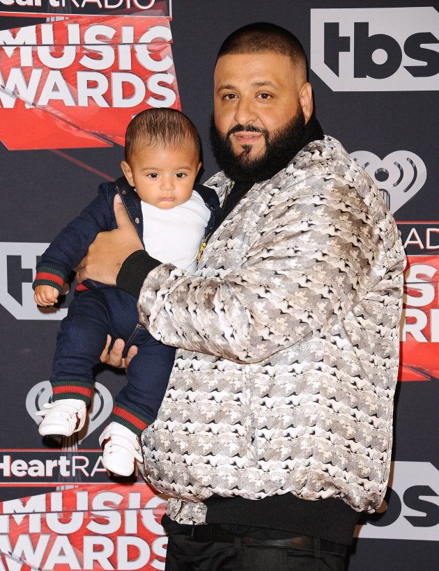 DJ Khaled and son Asahd Tuck Khaled pose in the press room at the 2017 iHeartRadio Music Awards.
