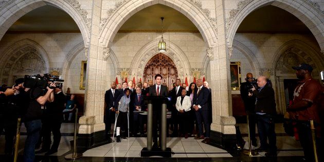 Prime Minister Justin Trudeau speaks with media after announcing the government's recognition of the UN's International Decade for People of African Descent.