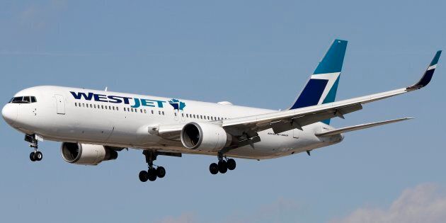 A Boeing 767 jetliner, belonging to WestJet Airlines, lands at Toronto Pearson International Airport on Oct. 19, 2017.