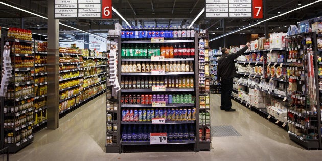A customer shops inside a Metro Inc. grocery store in Toronto, Mon. Oct. 2, 2017.