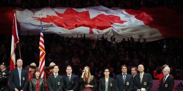 The 2017 Hall of Fame class during the national anthem during the Hockey Hall of Fame Legends Classic at the Air Canada Centre in Toronto on Nov. 12, 2017.
