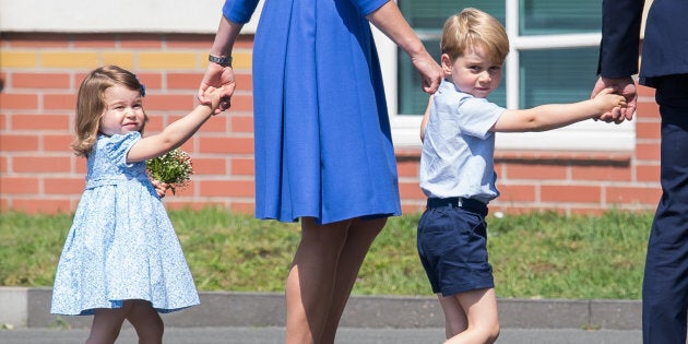 Prince George and Princess Charlotte arrive at Berlin military airport during an official visit to Poland and Germany on July 19, 2017.