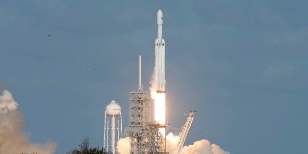 A SpaceX Falcon Heavy rocket lifts off from historic launch pad 39-A at the Kennedy Space Center in Cape Canaveral, Fla., Feb. 6, 2018.