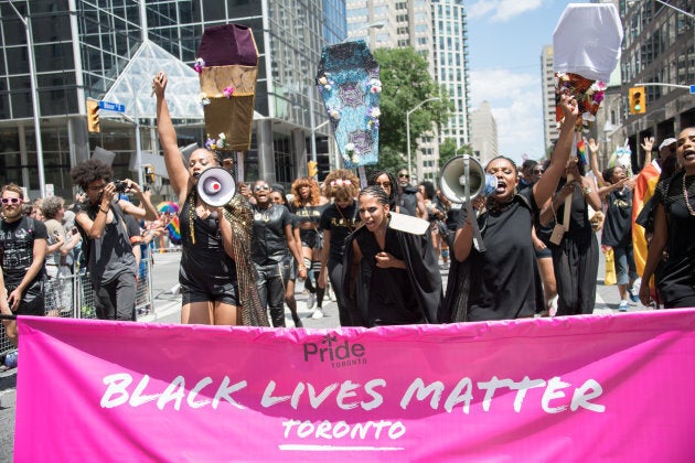 Black Lives Matter Toronto marching at the Toronto Pride Parade, where they would later stage a sit-in, on July 3, 2016.