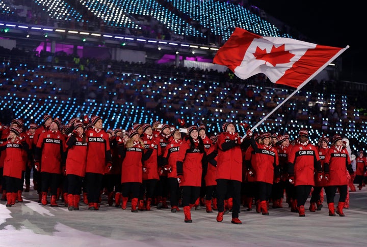 Tessa Virtue and Scott Moir do Canada proud. That's Moir taking a turn