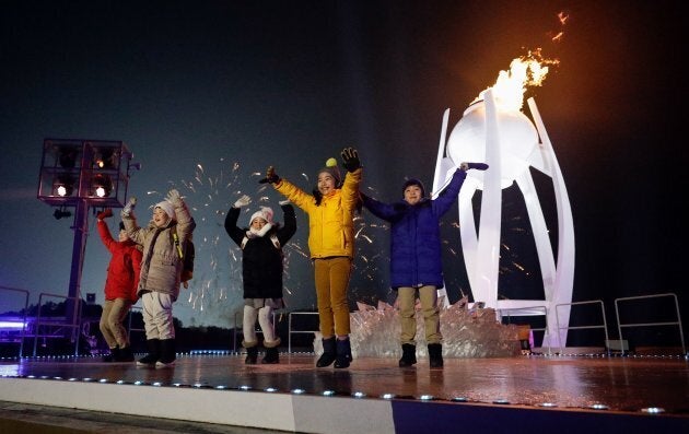 Children perform as the cauldron is lit during the opening ceremony of the PyeongChang 2018 Winter Olympic Games on Feb. 9, 2018.